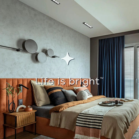 Four Head Regressed Gimbal Led Recessed Spotlight in stylish bedroom, sleek dark wall with contemporary decor.