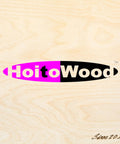 Front view: light birch plywood sheet with pink and black HoitoWood logo across the center.