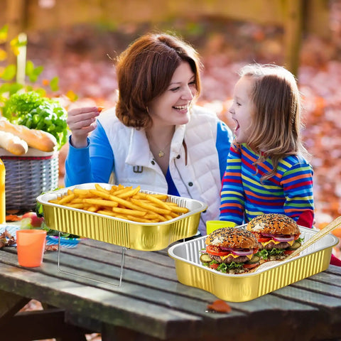 Four Sets Disposable Chafing Dishes Buffet Set With Chafer Wire Racks; burgers and fries served in gold pans at picnic