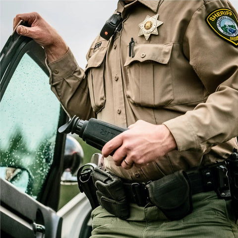 Officer holding Scion PTM366 Professional Thermal Monocular With Live Encrypted Video Streaming and TruWITNESS Public Safety Integration