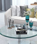 32 Inch Round Tempered Glass Lazy Susan Turntable Rock Solid Slick Beveled Edge Clear Tabletop Organizer atop a stylish living room table.
