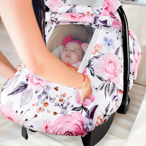 Girls Car Seat Cover Pea Pod Infant Canopy With Dual Windows And Breathable Mesh Lightweight Polyester shown in floral design on a car seat.