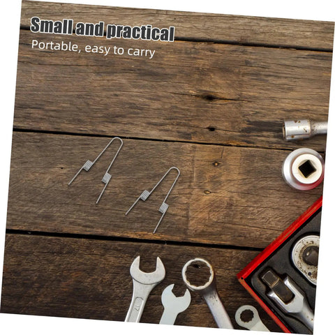 4 Pack Stainless Steel Dual Coil Torsion Springs For Trash Can Lid Repair With High Elasticity And Quiet Operation The Ultimate DIY Fix For Kitchen Garbage Bins That Open Smoothly Without Annoying Clanks. small stainless springs on wood with tools