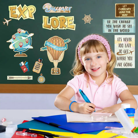 Travel The Map Bulletin Board Set For Classrooms 27 Piece Travel Cutouts With Maps Globes and Motivational Sayings on classroom wall.