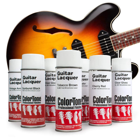 Get That Fresh Retro Vibe With This Badass Tobacco Sunburst Aerosol Finishing Set For Later Kalamazoo Electric Guitars Complete Eight Can DIY Refinish Kit For Slick Pro Results - Eight aerosol cans lined up with a tobacco sunburst guitar.