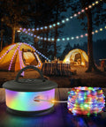 3 In 1 Camping String Lights With Retractable RGB LEDs 19 Lighting Modes Quick 30s Recovery 32.8 Ft Of Outdoor Tent Lighting Portable Rechargeable Lantern For Camping Emergency Flashlight And Work Light in a forest setting with tents and colorful string lights