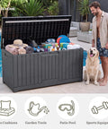 Extra Large 120 Gallon Outdoor Storage Deck Box With No Sweat Hydraulic Lift Lid holding pool gear and patio items by a pool.