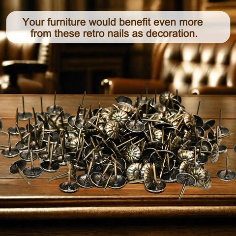 Top Shelf Brass Upholstery Tacks For Furniture Restoration, 200 Piece Box Of Classic Vintage Decorative Nail Pins in a pile on a table.