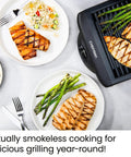Smokeless Indoor Grill With Nonstick Cooking Surface And Adjustable Temperature From Warm To Sear For Realistic At Home BBQ Flavor Easy Cleanup With Dishwasher Safe Water Tray Black grilling chicken and asparagus