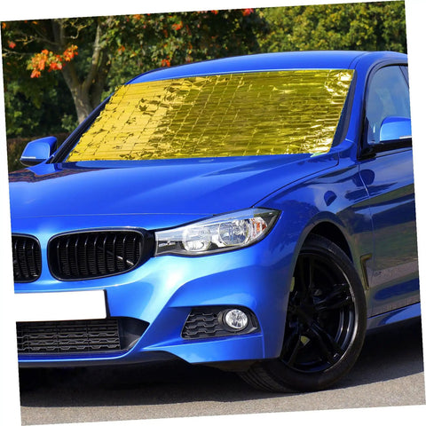 Go-To 6-Piece Survival Emergency Blanket Set With Gold And Silver Reflective Foil used on blue car windshield