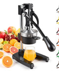 Cast Iron Manual Citrus Juicer Heavy Duty Orange Press with a glass of juice and assorted fruits on a countertop.