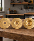Three Piece Wood Carving Disc Kit For Angle Grinders Four Inch And Four Point Five Inch Tungsten Carbide Cutting Wheels on table