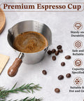 Espresso Shot Cup With Wood Handle, 6.8 Oz Stainless Steel Measuring Cup For Barista Grade Cappuccino, shown with coffee.