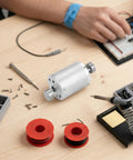 Dual Shaft 12V DC Vibration Motor with high torque, shown on workspace with tools, for DIY vibe devices and prototyping projects.