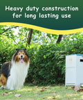 Heavy Duty Automatic Dog Feeder Holds A Ton Of Twenty Five Pounds Of Dry Kibble Rugged Galvanized Steel Outdoor Pet Bowl Station With Paw Pressed Door For Big Dogs Built Tough For Busy Parents next to a large dog in a green outdoor setting.