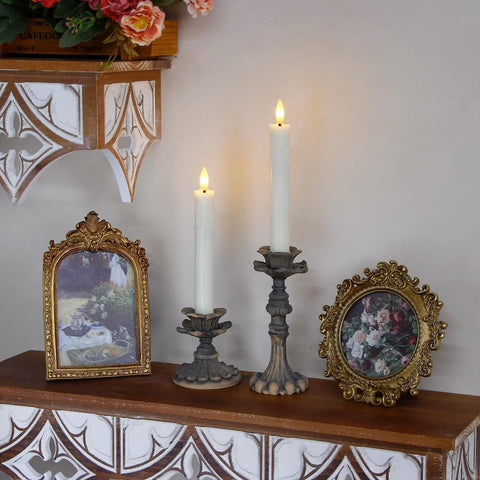 Two 7.5 inch ivory LED window candles, flameless with a flickering effect, in ornate holders, showcasing a safe home decor vibe.