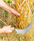Person using Six Pack Weeding Sickle Replacement Heads With Three Styles Carbon Steel Blades For Garden Weed Removal on hay