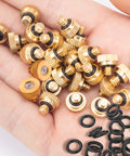 Brass Misting Nozzles Pack With O Rings 0.012 Inch Orifice 10 By 24 UNC in hand showing brass nozzles and black O-rings