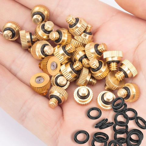 Brass Misting Nozzles Pack With O Rings 0.012 Inch Orifice 10 By 24 UNC in hand showing brass nozzles and black O-rings