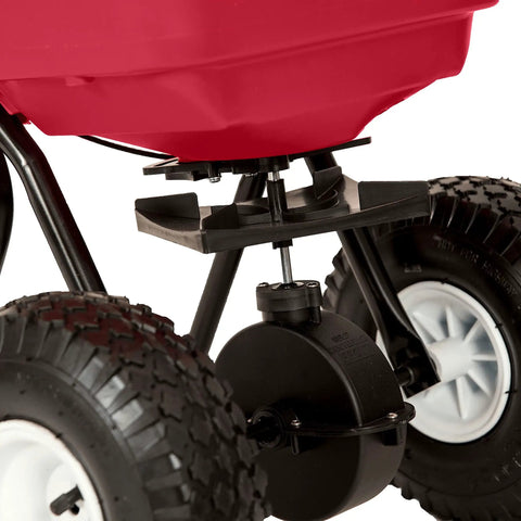 Close-up of rustproof poly hopper and wheels on Big 80lb Capacity Broadcast Spreader for Lawns and Seeds, pre-assembled