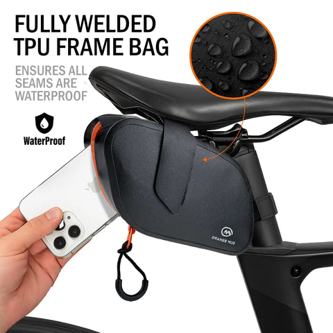 Waterproof Bike Seat Bag With TPU Welded Triangle Frame And YKK Zipper attached to bike, phone being inserted.