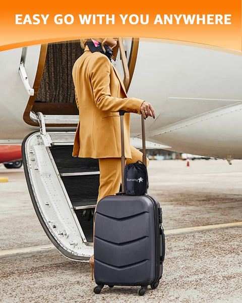 Traveler boarding plane with suitcase, carrying Inflatable Travel Neck Pillow With Eye Mask and Ear Plugs, Compact Gray Design