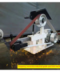 Heavy Duty Desktop Belt Sander With Smooth Stepless Speed Regulation And Three Badass Grinding Wheels Top Tier Bench Grinder For Woodshop Projects 1500W 110V in use with sparks flying.