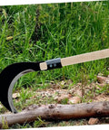 Wooden Sickle Handle Grip With Ergonomic Design And Noslip Comfort For Sickle Replacement on grass with sickle blade attached