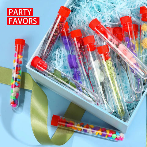 50 Pack Clear Plastic Test Tubes 16x100mm With Red Caps And Blue Rack Holder For Nurse Party Decor And Halloween Favors Durable Plastic Safe For Experiments And Stem Classroom Activities, filled with colored decorations and placed on a party setup.