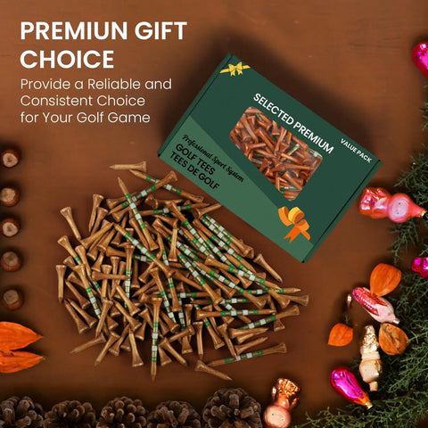 Birch Wood Golf Tees Value Pack 100 Count With 80 Regular Tees In Two And Three Quarters Or Three And A Quarter Inches And 20 Short One And A Half Inch Driving Range Tees Tan Color 5X More Durable 5X Stronger Less Friction For Consistent Drives displayed in a decorative setting with gift items.