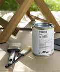 Top Shelf Exterior Wood Stain For Outdoor Decks And Patios Waterproof Sealant With Superior UV Resistance 500 Ml can with brushes and cardboard.