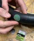 Applying peel and stick patch on bike tire from Bike Tire Patch Kit With Peel And Stick Patches And Extra Tough Tire Levers.