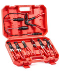 Open red plastic tool case containing automotive hose clamp pliers kit with long-reach pliers and assorted clamp tools.