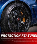 Close-up of Four Pack Car Wheel Center Hub Caps With Metallic Skull Badge on a wet tire, showcasing durability and design.