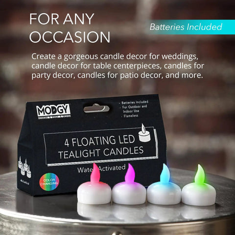 Color Changing Lumizu Water Activated LED Floating Candles Four Pack For Poolside Tables And Outdoor Ambiance Lit Multi Color Glow Battery Powered Flicker Without A Wick, candles displayed on table