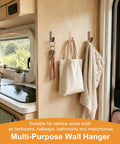 No Sweat Self Adhesive Wood Hooks, 6 Piece Set With Real Beech And Walnut Grain, hanging keys and bags in a camper kitchen.