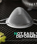 3.3 Inch Fine Mesh Strainer 304 Stainless Steel Cocktail Sieve in conical shape, ideal for tea and coffee filtering on black textured surface