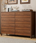 Mid Century Modern Dresser Boasting Eight Spacious Drawers And A Rich Walnut Finish Resting On Robust Wood Legs, organized and elegant.