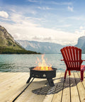 19 Inch Portable Propane Fire Pit With 58,000 BTU Auto Ignition Smokeless Gas Firebowl on a lakeside deck with red chair
