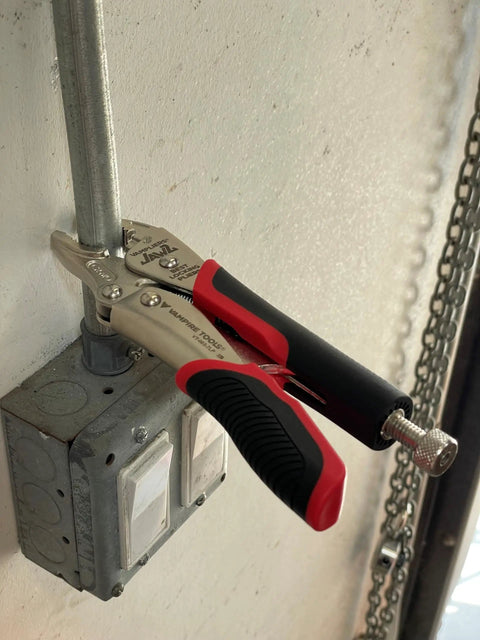 7.5 Inch Heavy Duty Locking Pliers with Screw Extractor and Curved Jaws gripping electrical conduit, quick release handle visible.