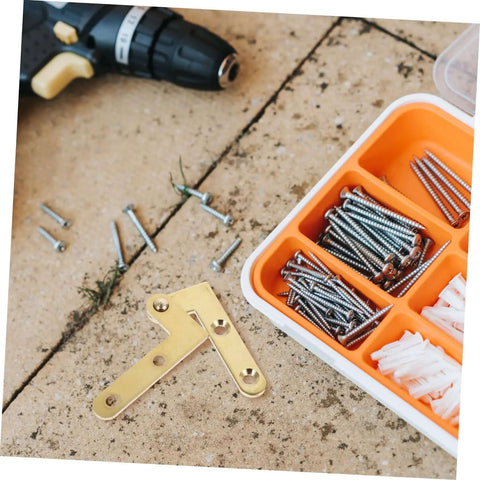 Rotatable Copper Pivot Door Hinges Set For Hidden Doors And Cabinets, screws, drill, and organizer tray on a workbench