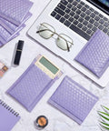 100 Count Bubble Mailer Set Four Sizes Self Adhesive Waterproof Padded Envelopes For Shipping with laptop and glasses