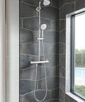 Tempesta Cosmopolitan 2.5 GPM 4-Spray Hand Shower In Starlight Chrome installed in modern bathroom.