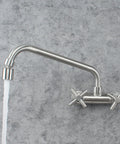 Wall Mount Commercial Kitchen Faucet 4 Inch Center, Stainless Steel Brushed Nickel, Two-Handle Utility Sink Bar Faucet With 11 Inch Spout And Aerator, SUS304 High Quality Finish against grey wall.