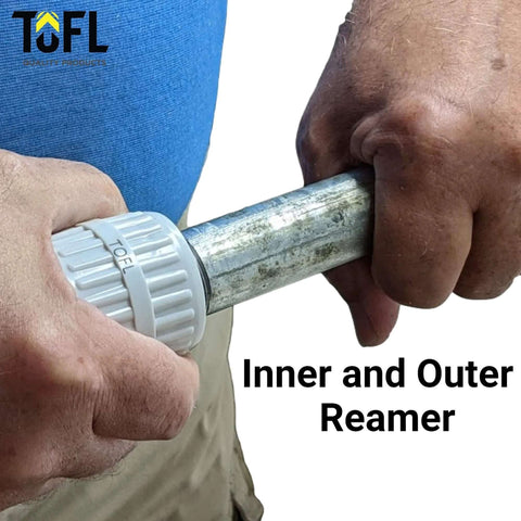 TOFL stainless steel pipe reamer tool in-use on metal pipe removes burs