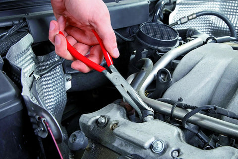 Using Pro-Grade Three Piece Long Nose Pliers Tool Set For Precision Gripping And Bend-Back Jaws on engine