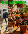 Sun Powered Drip Irrigation System With Auto Watering Kit And Timer for pots and planters, installed on garden wall.
