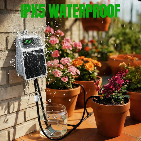 Sun Powered Drip Irrigation System With Auto Watering Kit And Timer for pots and planters, installed on garden wall.