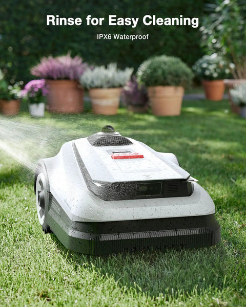 Goat A3000 LiDAR Robot Lawn Mower With Dual LiDAR Navigation for Large Yards under rinse on grass, highlighting IPX6 waterproof feature.