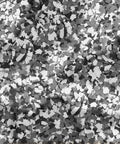 Close-up of 20 Lb Decorative Epoxy Floor Flake Kit for Garage and Concrete Surfaces Black White Gray Color Chips Blend